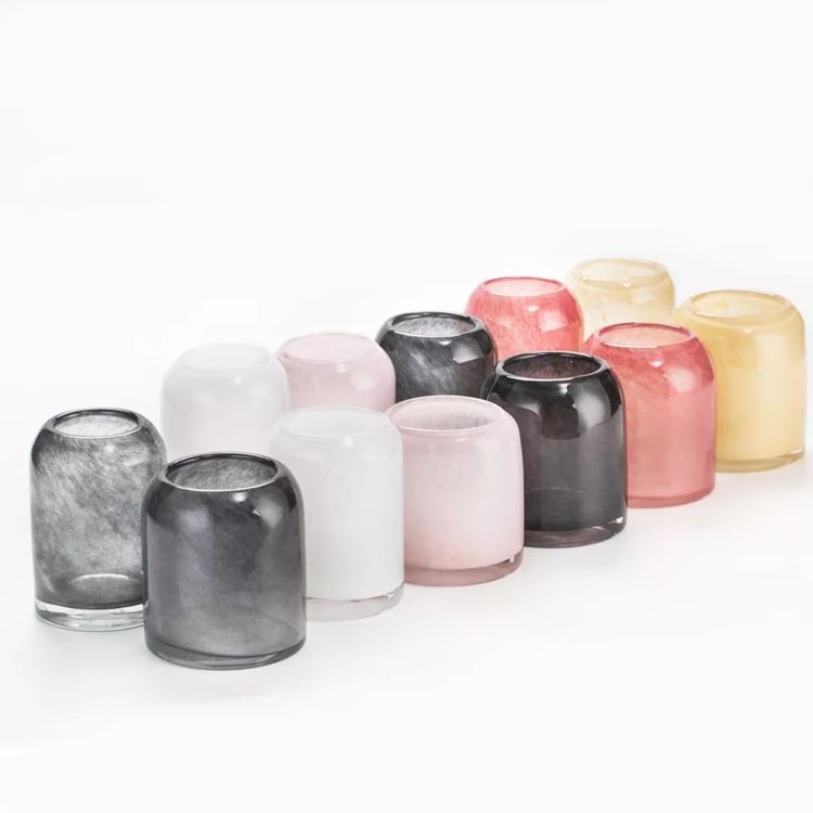 Swirled color glass candle wax cup