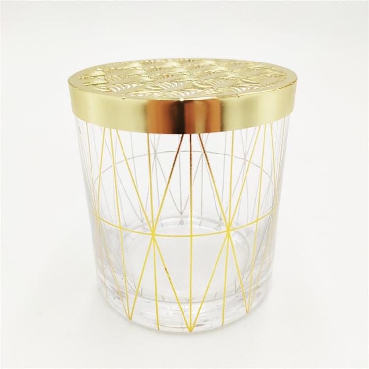 Pierced gold metal lid scented glass candle holder laser engraving glass candle jar