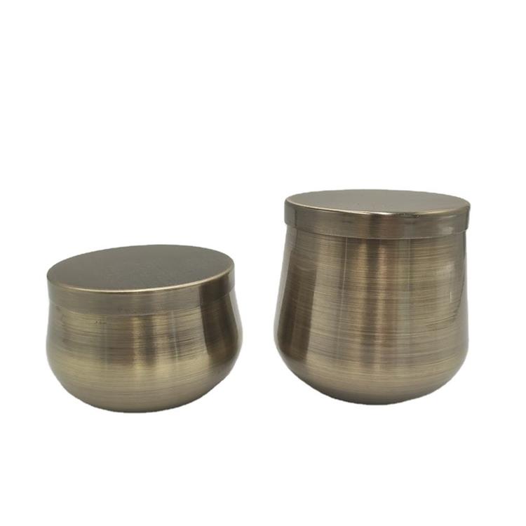 Brushed brass color metal candle holder with metal lid